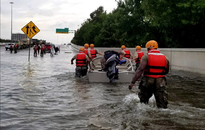 Members of the Texas Army National Guard travel through streets flooded by Hurricane Harvey, Aug. 28, 2017. Photo: Lt. Zachary West, Army National Guard